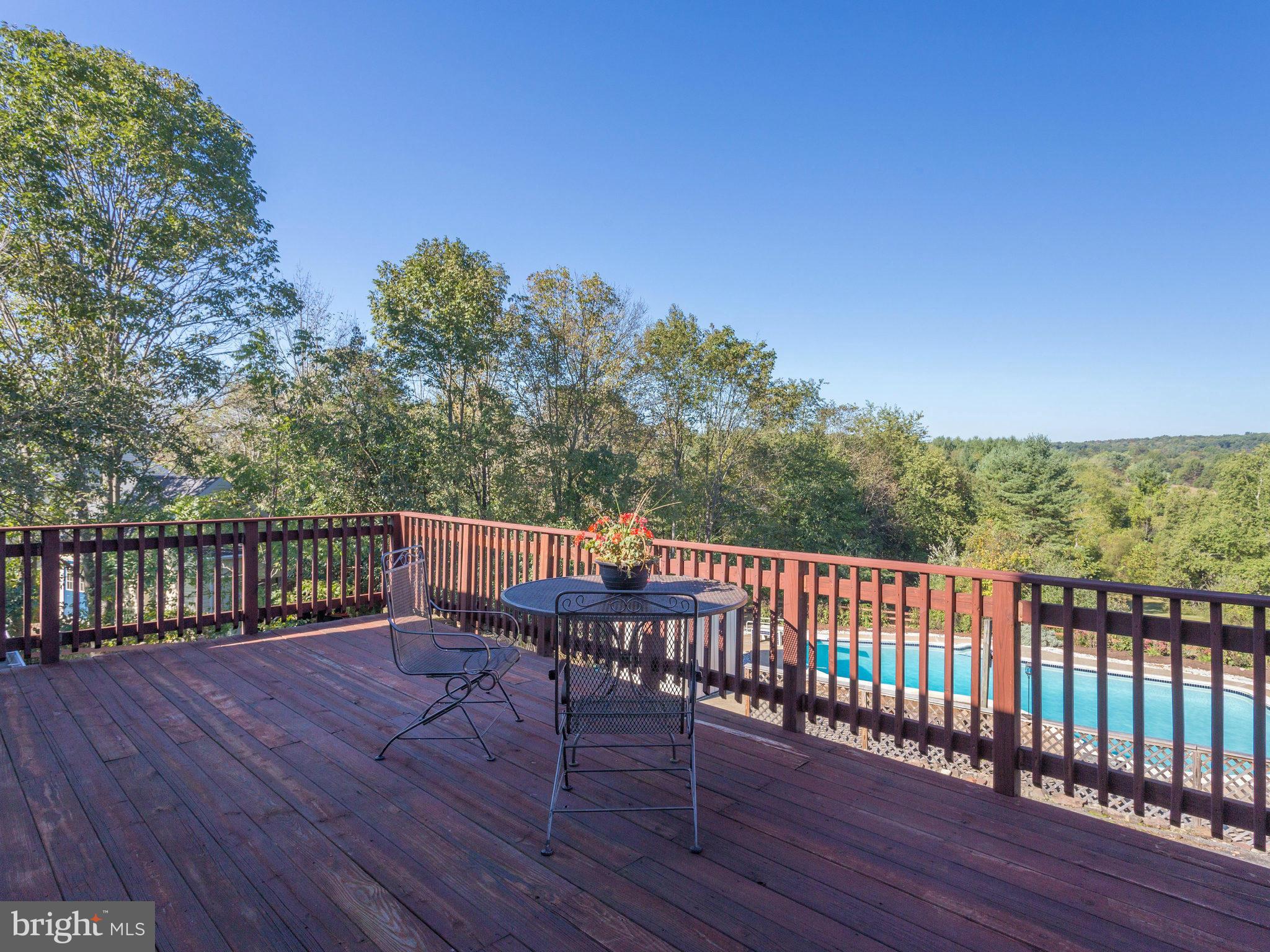 20473 Gleedsville Road Leesburg, VA 20175 - Photo 3 of 30 a view of a two chairs on the roof deck