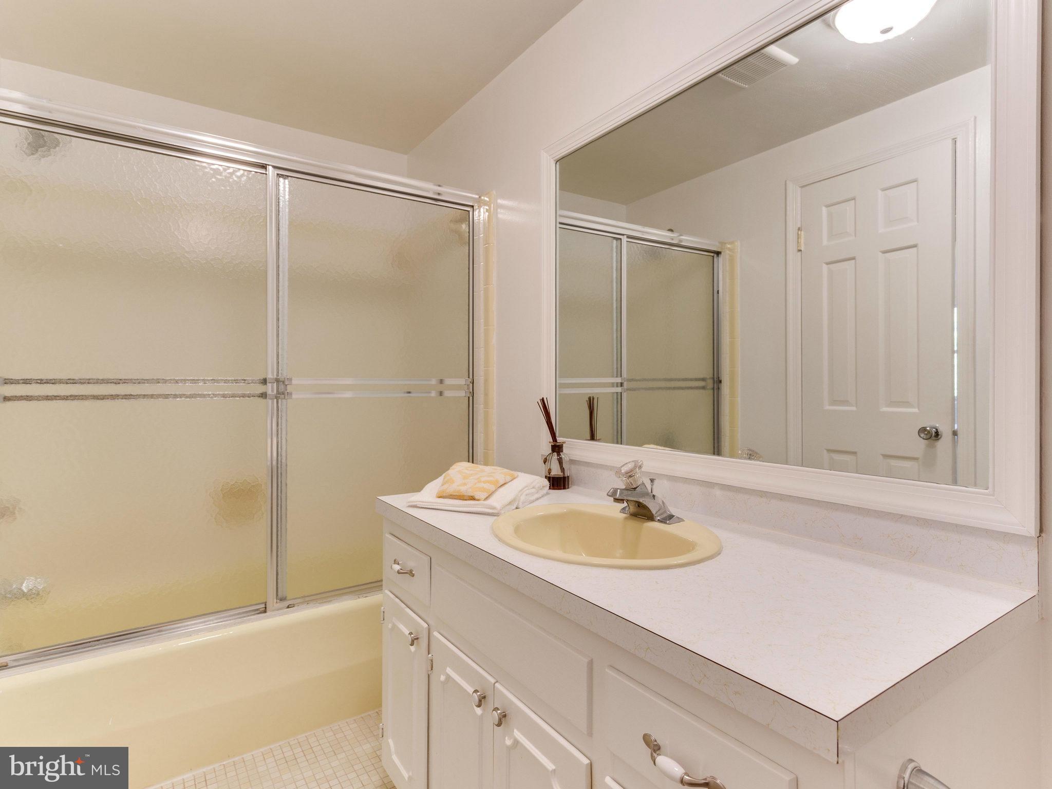 20473 Gleedsville Road Leesburg, VA 20175 - Photo 24 of 30 a bathroom with a sink and a mirror