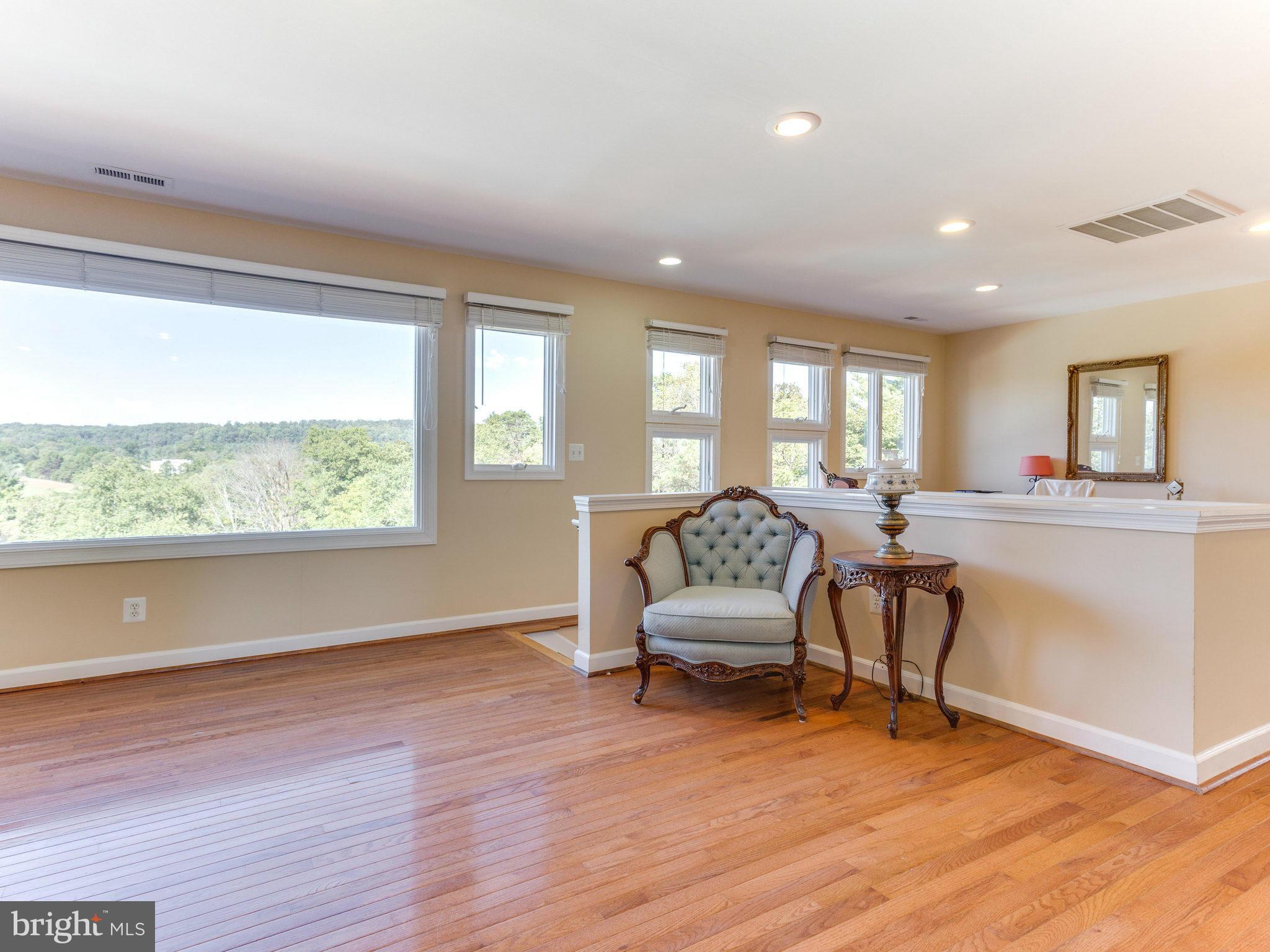 20473 Gleedsville Road Leesburg, VA 20175 - Photo 26 of 30 a living room with furniture and a large window