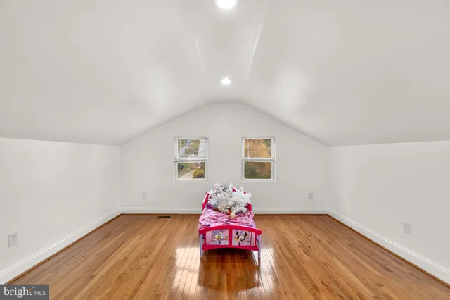 a very nice looking room with wooden floor