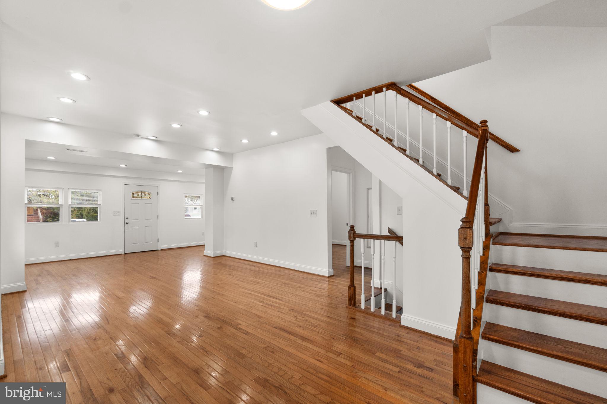 4525 Mainfield Avenue Baltimore, MD 21214 - Photo 6 of 33 a view of entryway with wooden floor