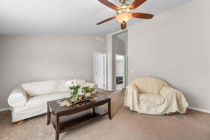 64945 McGrath Road Bend, OR 97701 - Photo 13 of 22 Family room is large and has great separation from the living room