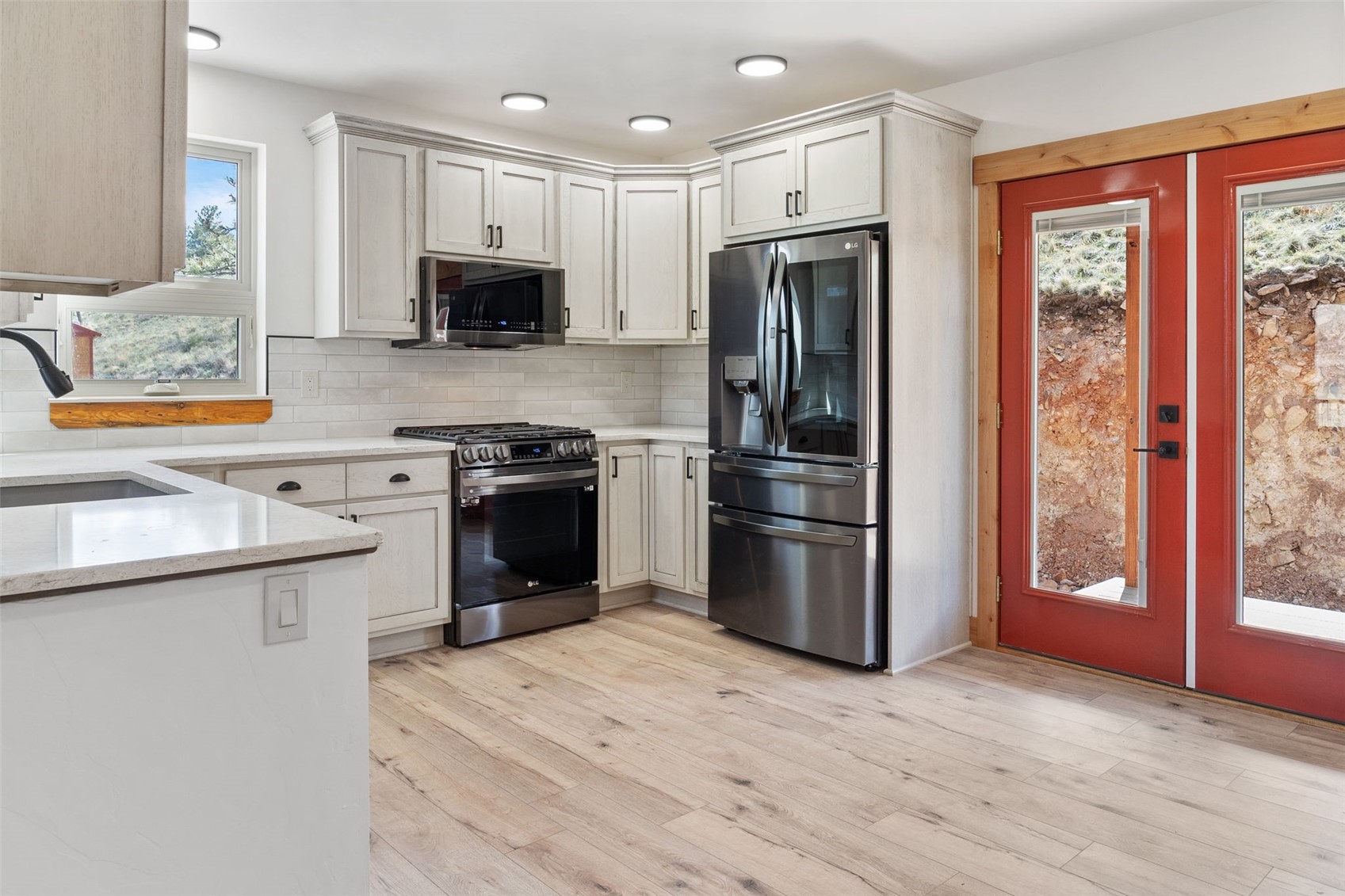 3415 Redhill Road Fairplay, CO 80440 - Photo 13 of 50 a kitchen with stainless steel appliances granite countertop a refrigerator stove and sink