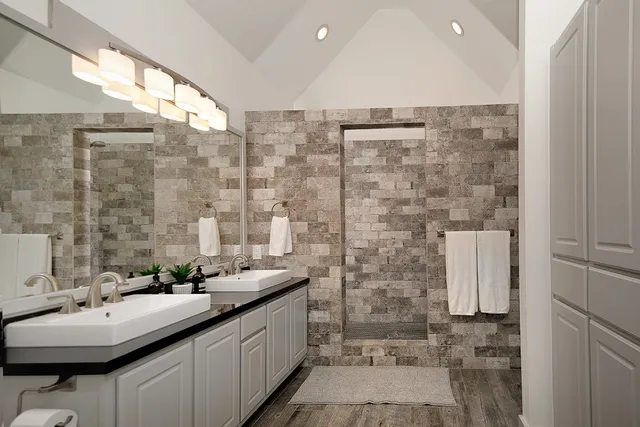 a bathroom with a sink and a mirror