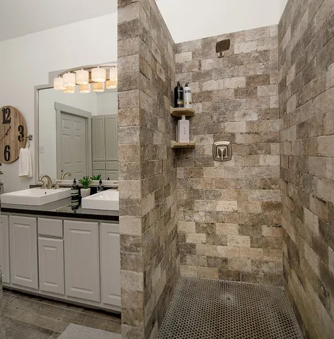 a bathroom with a sink and a mirror