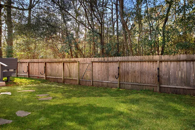a backyard of a house with lots of green space