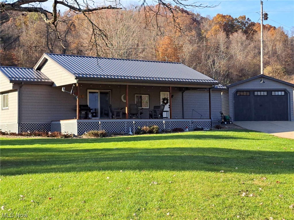Front of Home, Covered Porch, and Garage
