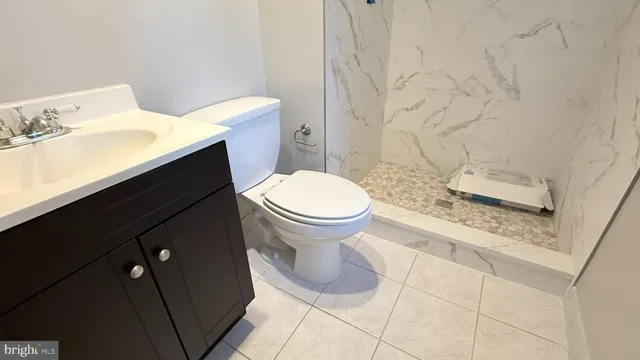 a bathroom with a sink and a toilet