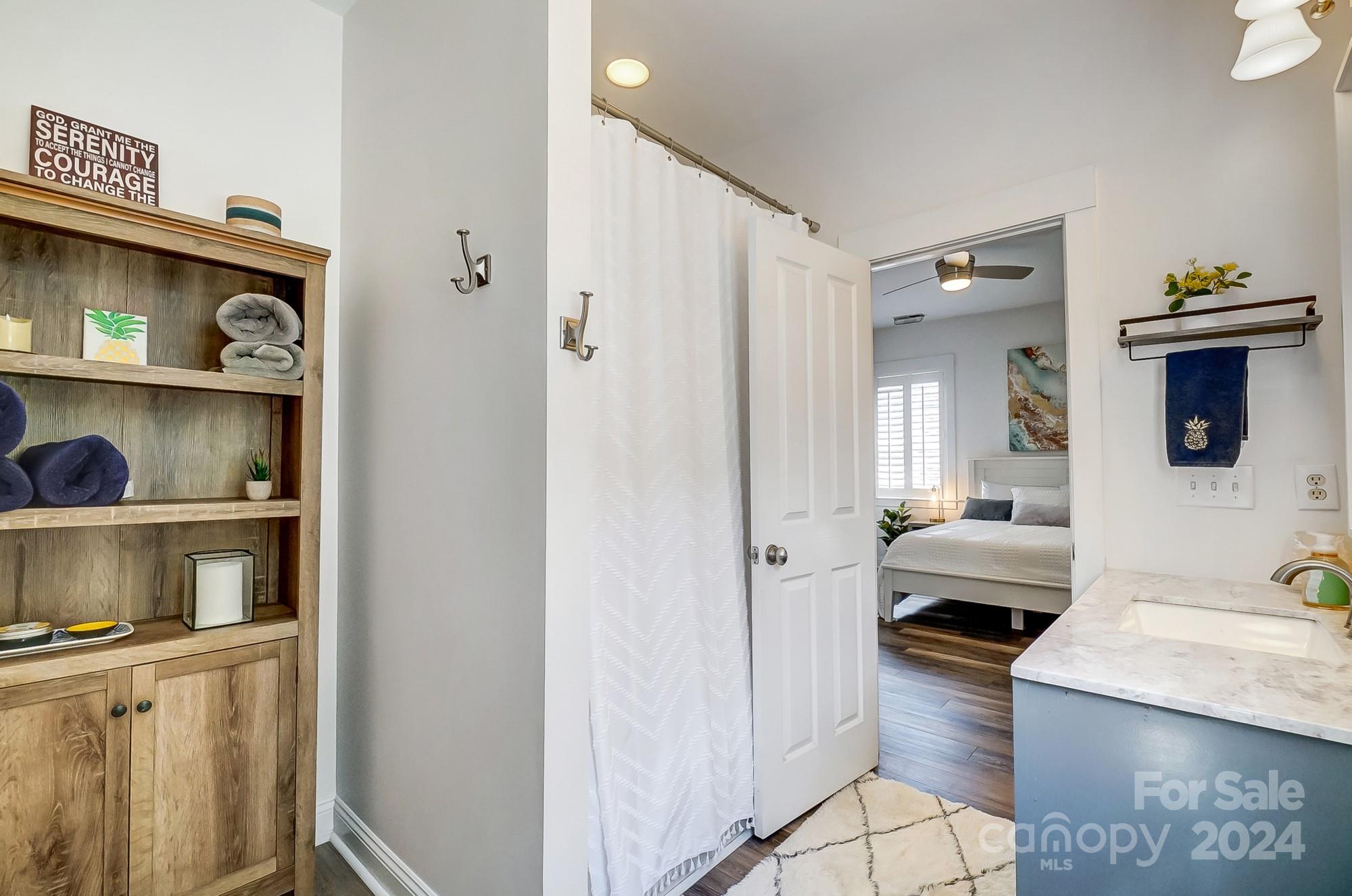 11343 Deer Ridge Lane Charlotte, NC 28277 - Photo 24 of 35 a en suite bathroom with a sink a toilet and shower