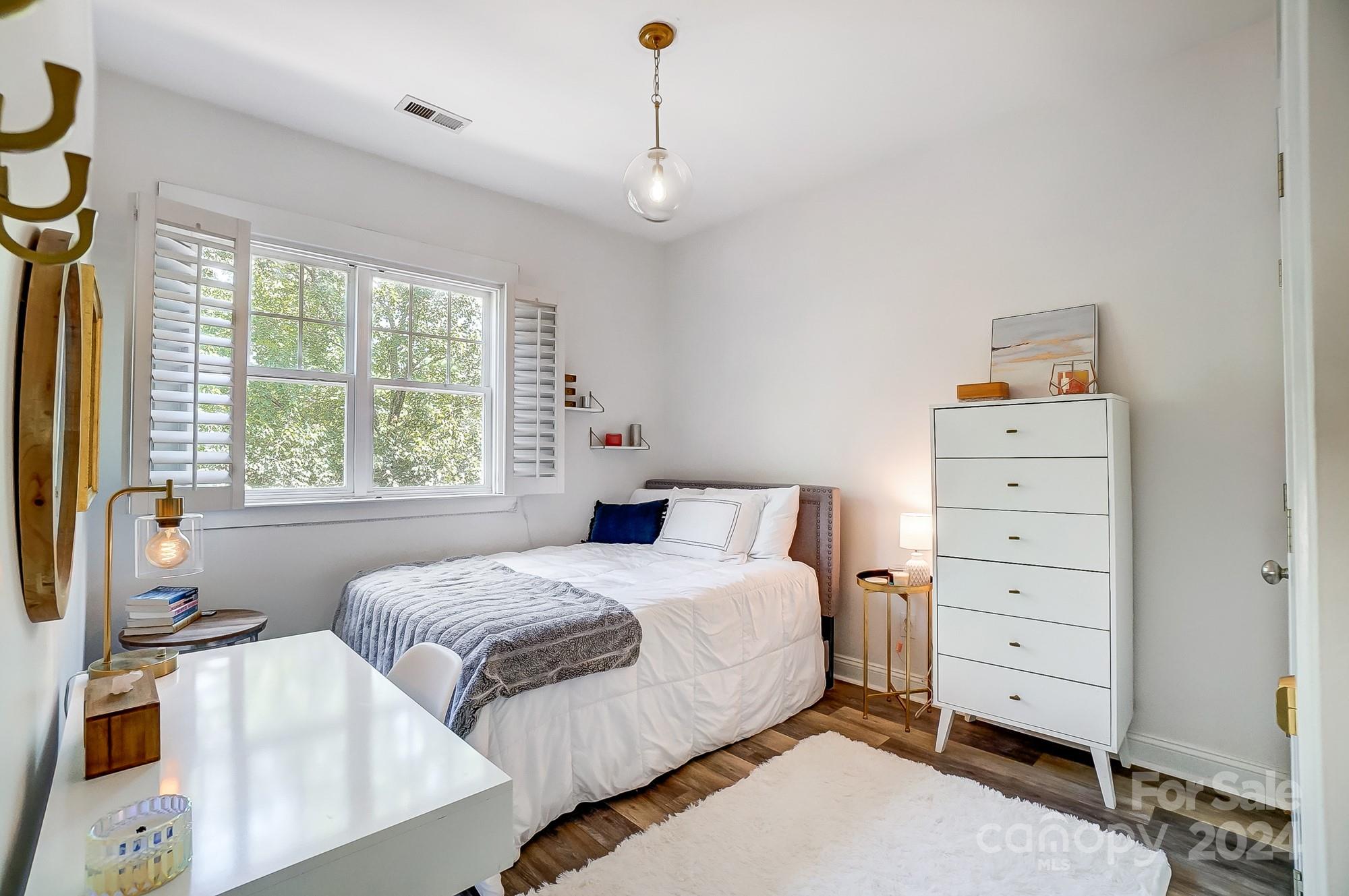 11343 Deer Ridge Lane Charlotte, NC 28277 - Photo 26 of 35 a bedroom with a bed and a window