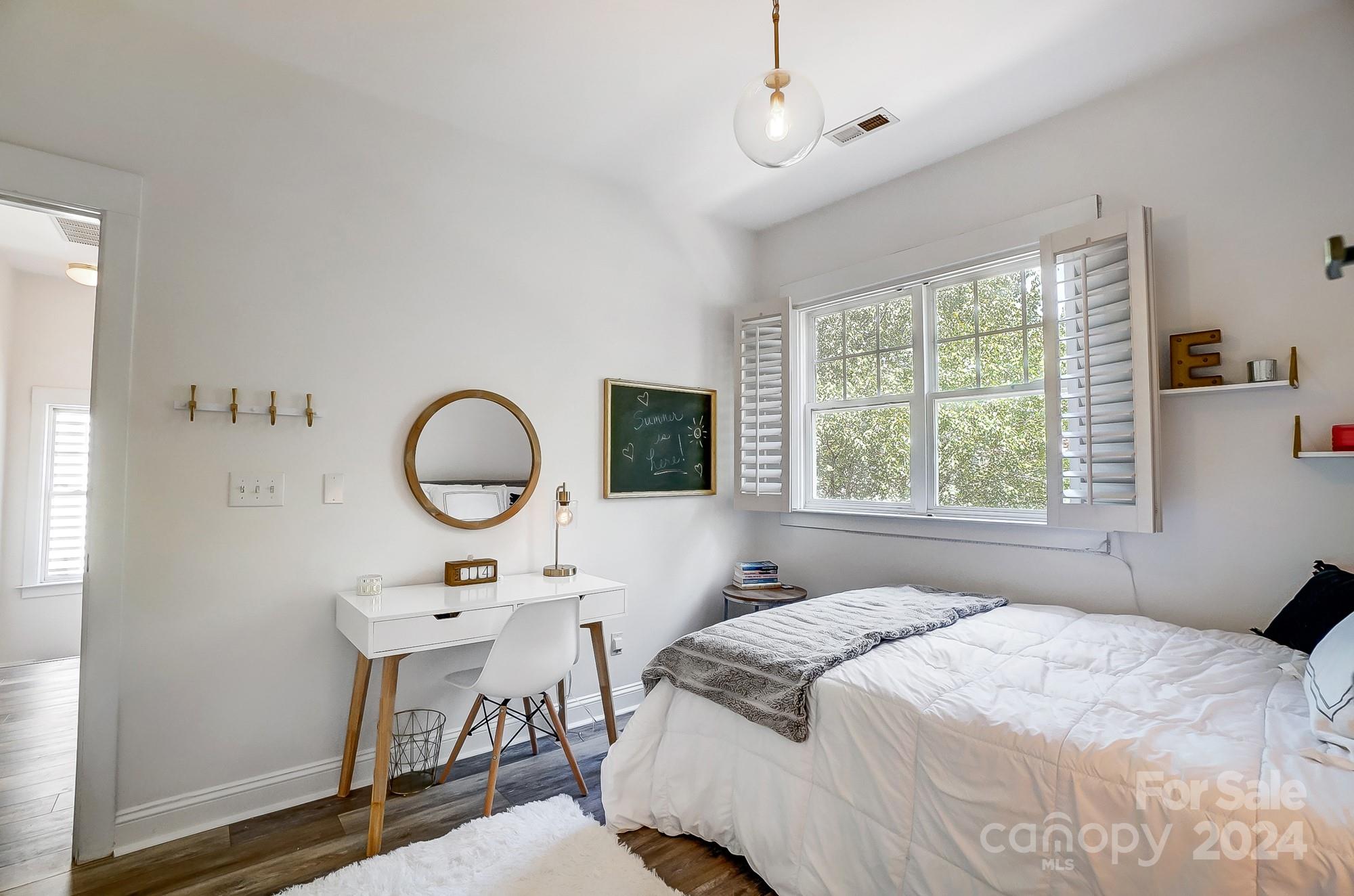 11343 Deer Ridge Lane Charlotte, NC 28277 - Photo 27 of 35 a bedroom with a bed and a large window