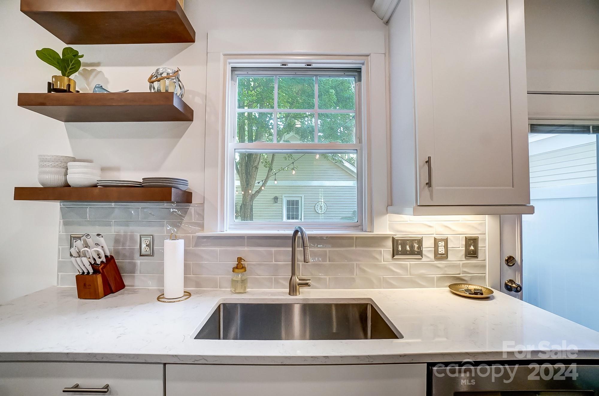 11343 Deer Ridge Lane Charlotte, NC 28277 - Photo 6 of 35 a kitchen with a sink and a window