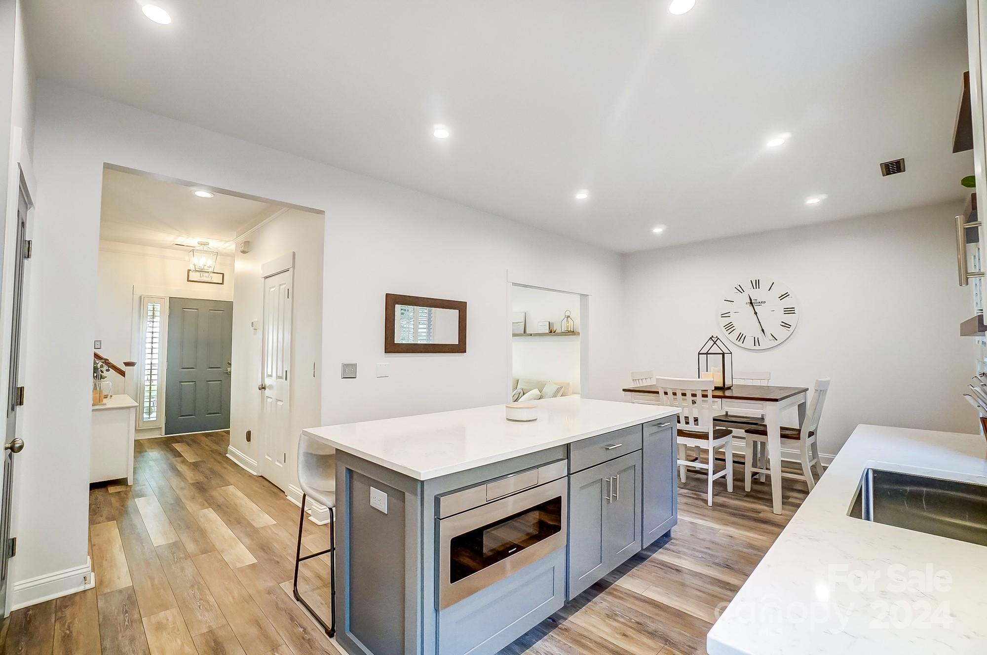 11343 Deer Ridge Lane Charlotte, NC 28277 - Photo 7 of 35 a kitchen that has a lot of cabinets in it