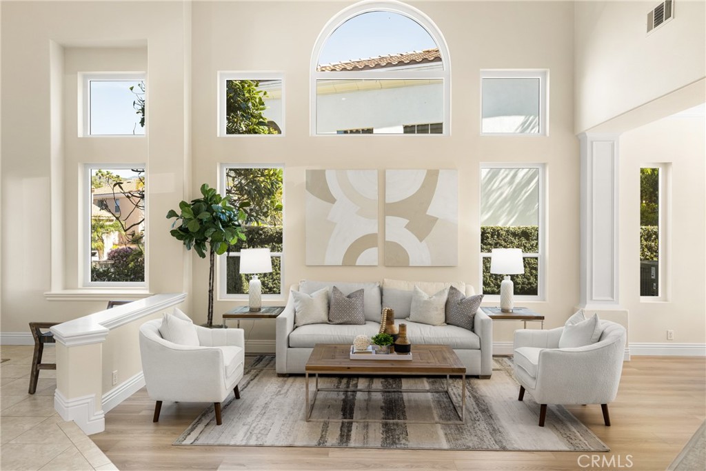 36 Mallorca Lake Forest, CA 92610 - Photo 12 of 64 a living room with furniture a table and a potted plant