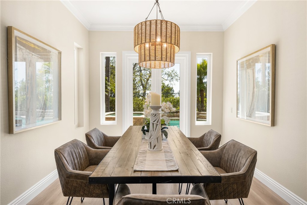 36 Mallorca Lake Forest, CA 92610 - Photo 15 of 64 a dining room with furniture and window