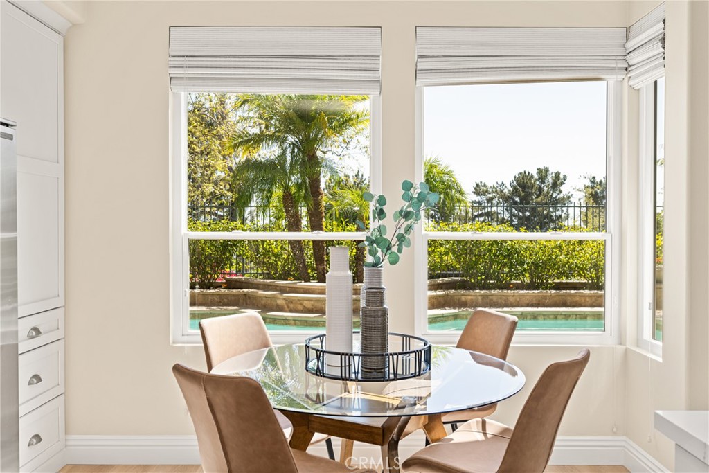 36 Mallorca Lake Forest, CA 92610 - Photo 20 of 64 a view of a dining room with furniture wooden floor and a window