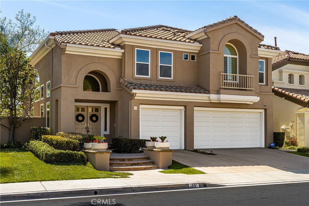 36 Mallorca Lake Forest, CA 92610 - Photo 2 of 64 a front view of a house with garden