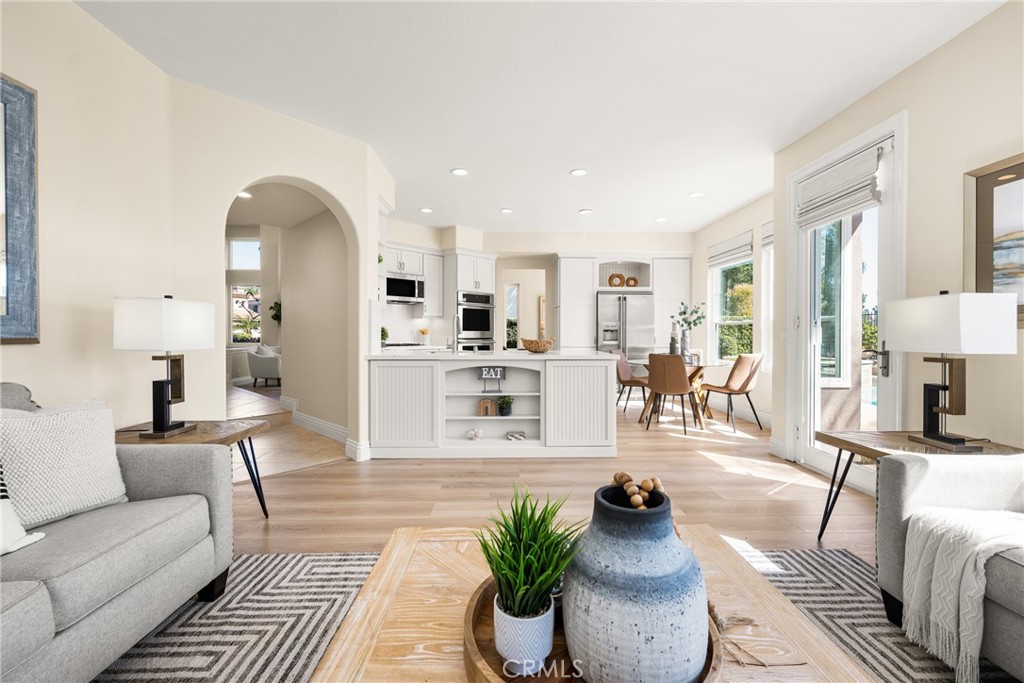 36 Mallorca Lake Forest, CA 92610 - Photo 23 of 64 a living room with furniture and wooden floor