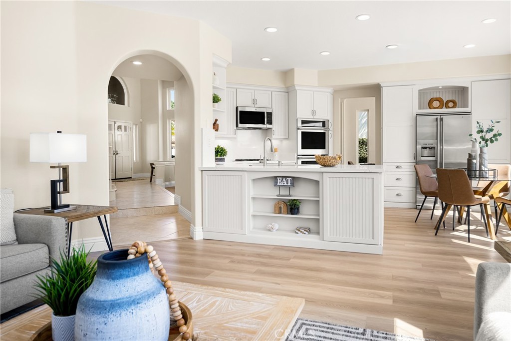 36 Mallorca Lake Forest, CA 92610 - Photo 24 of 64 a living room with furniture and a wooden floor