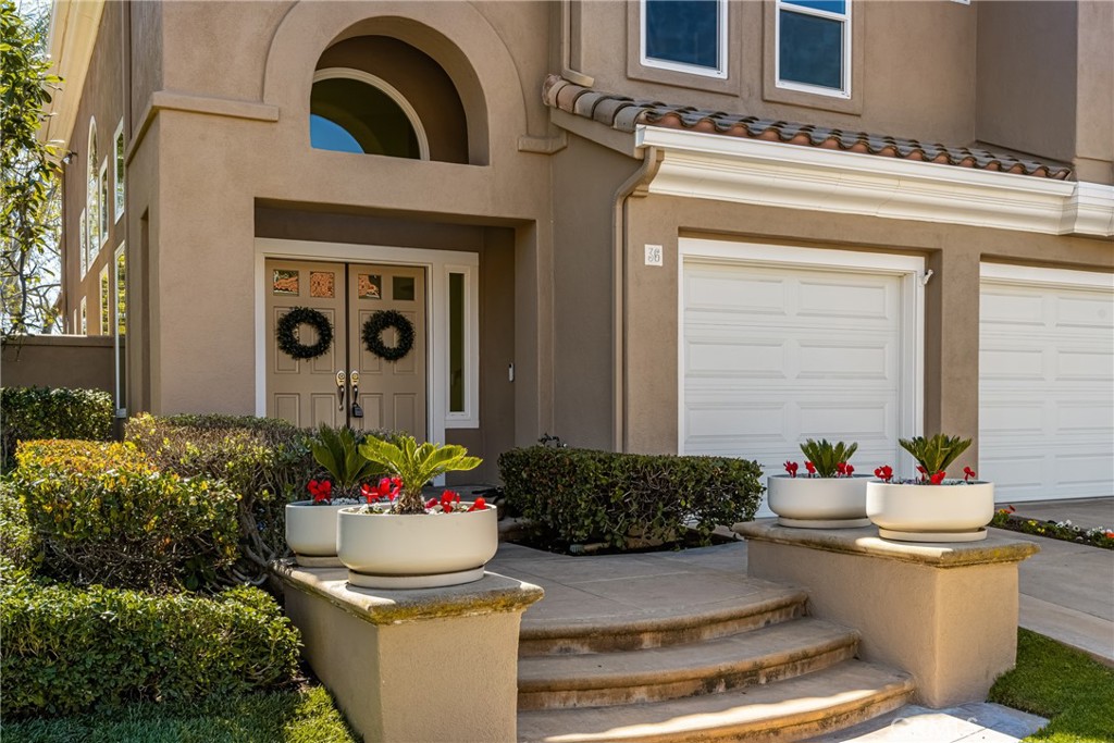 36 Mallorca Lake Forest, CA 92610 - Photo 3 of 64 a front view of a house with a yard