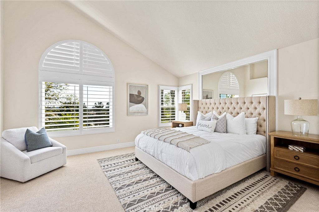 36 Mallorca Lake Forest, CA 92610 - Photo 36 of 64 a bedroom with bed and a large window
