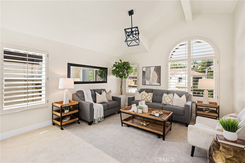 36 Mallorca Lake Forest, CA 92610 - Photo 45 of 64 a living room with furniture and a large window