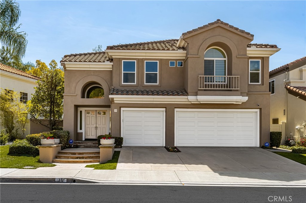 36 Mallorca Lake Forest, CA 92610 - Photo 64 of 64 a front view of a house with yard