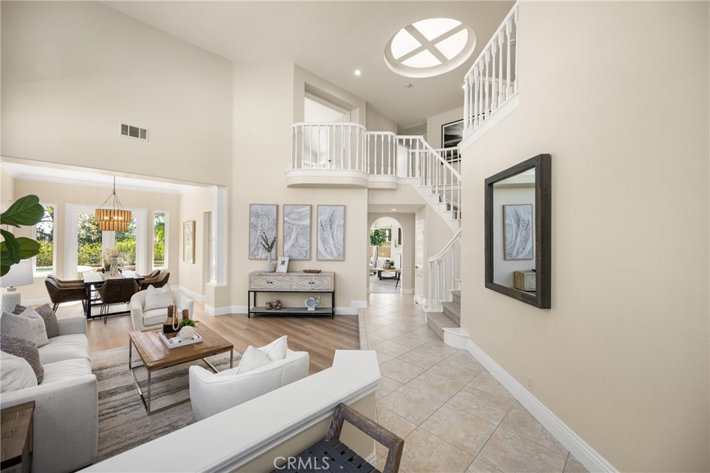 36 Mallorca Lake Forest, CA 92610 - Photo 8 of 64 a living room with furniture and a large window