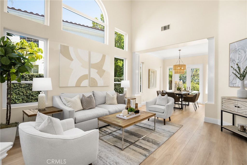36 Mallorca Lake Forest, CA 92610 - Photo 10 of 64 a living room with furniture and a large window