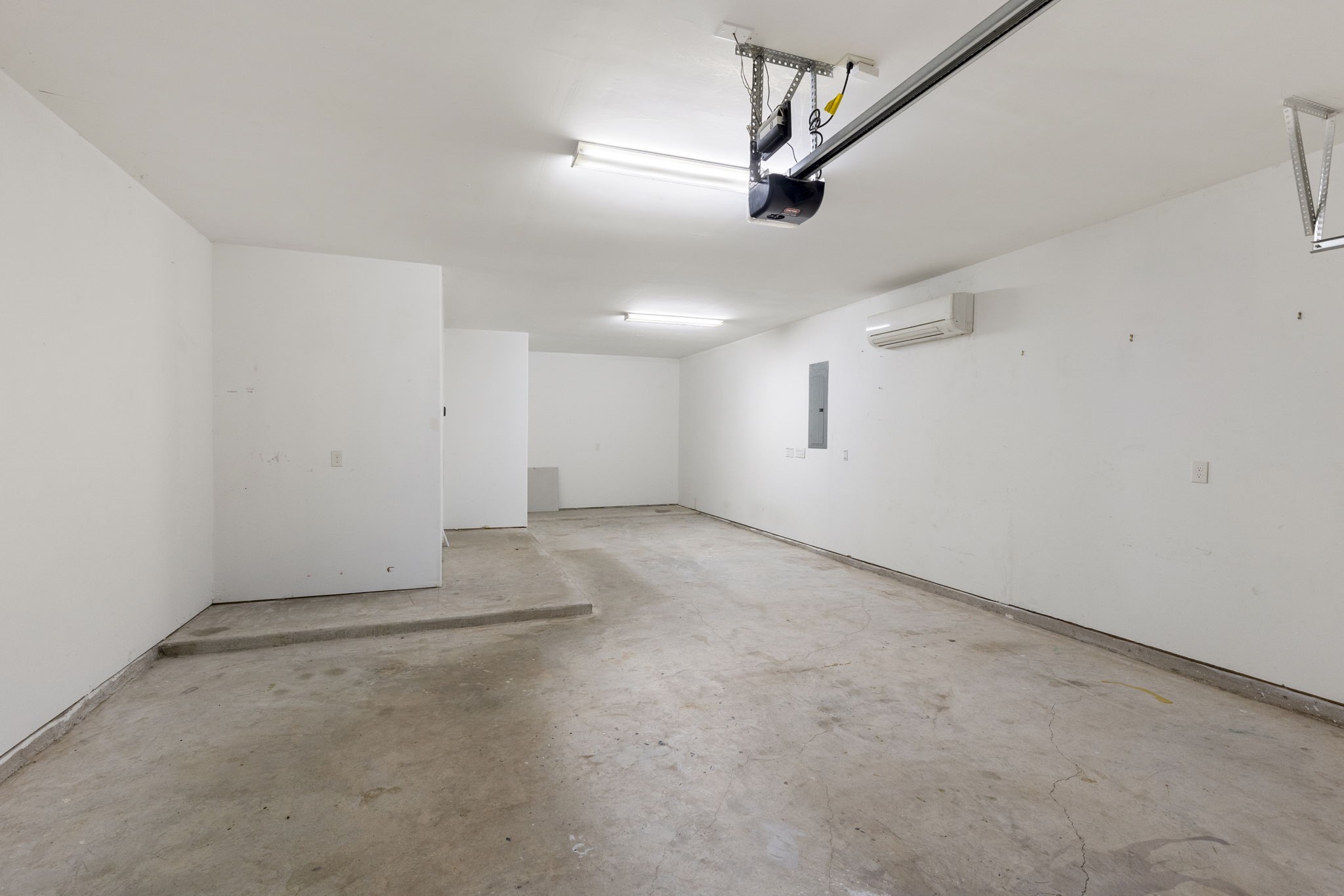 18855 Collins View Drive New Caney, TX 77357 - Photo 25 of 50 an empty room with a ceiling fan and windows