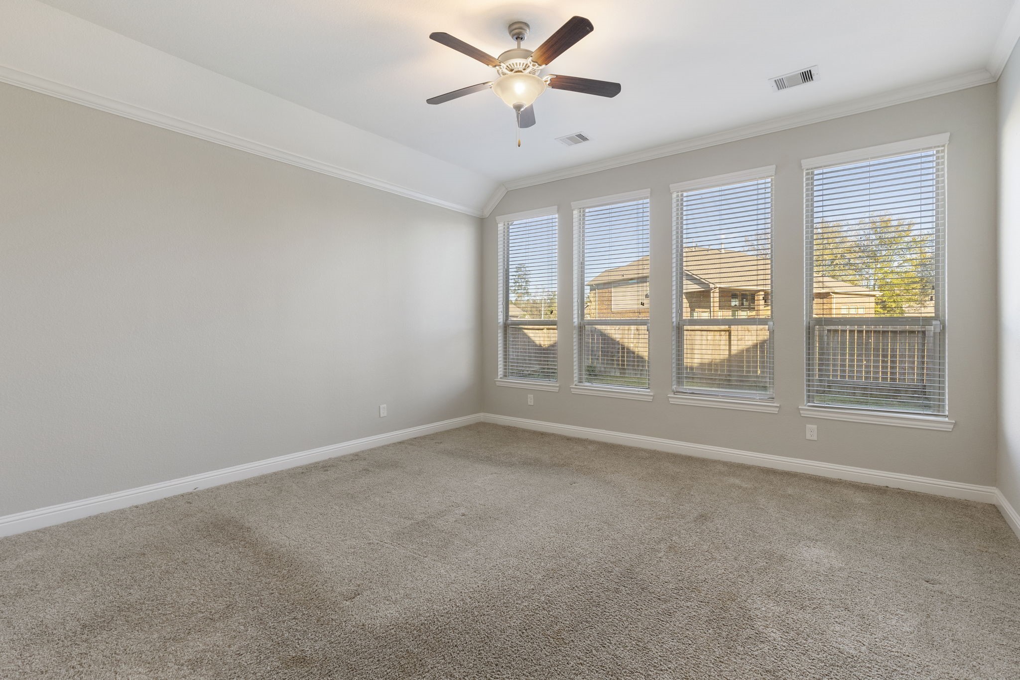 18855 Collins View Drive New Caney, TX 77357 - Photo 37 of 50 a view of an empty room with a window