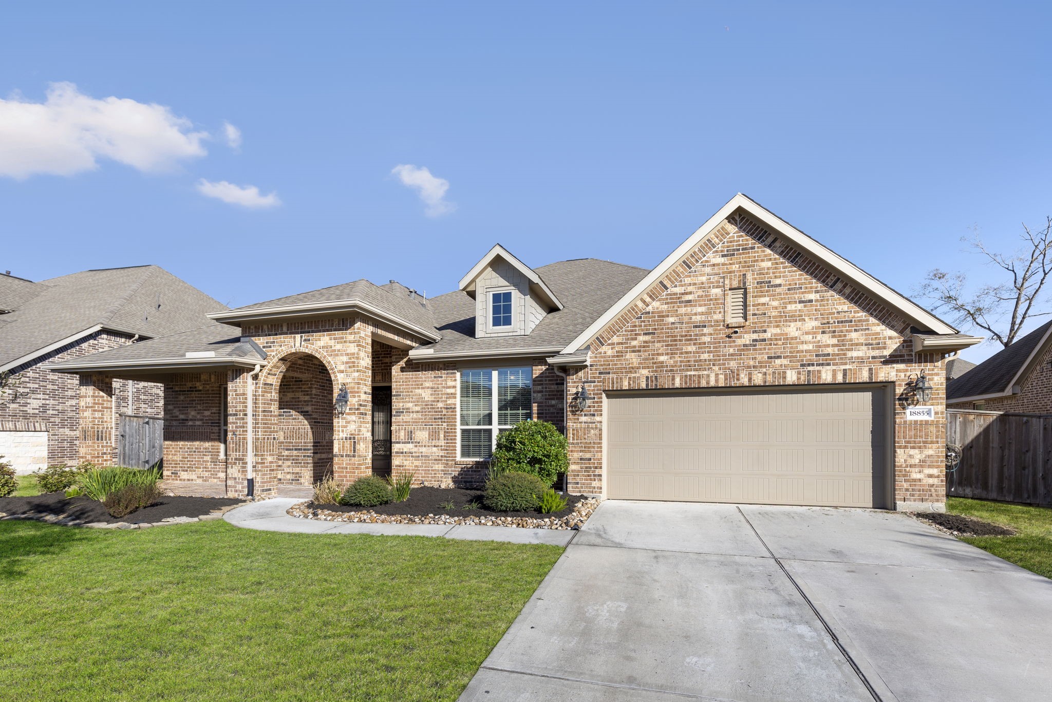 18855 Collins View Drive New Caney, TX 77357 - Photo 4 of 50 a front view of a house with yard