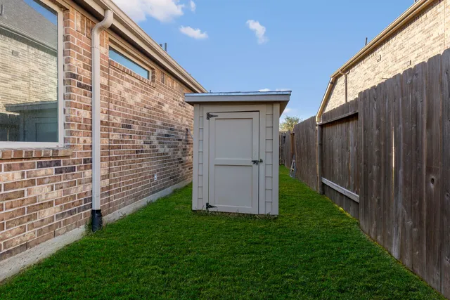 a backyard of a house with a small yard