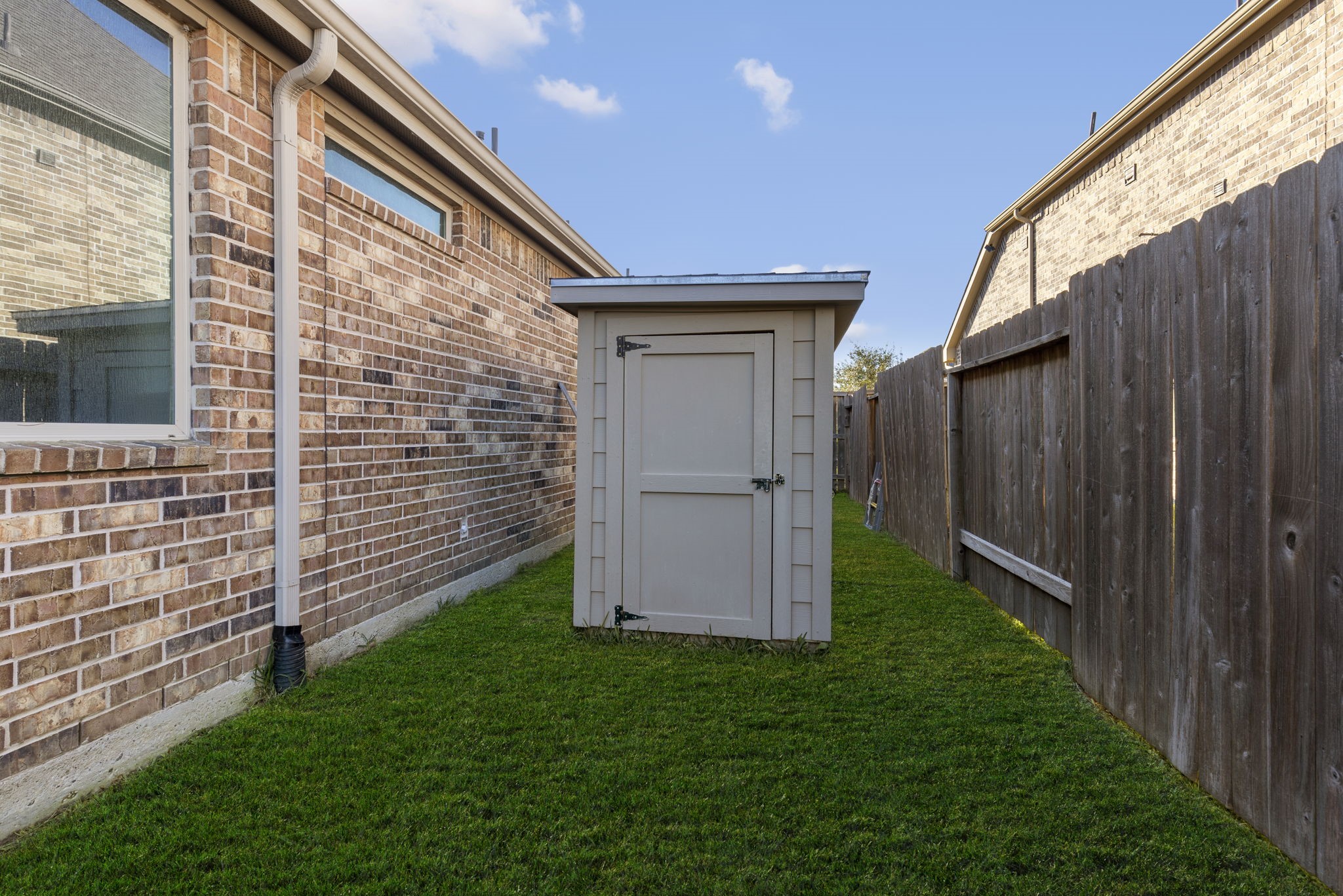 18855 Collins View Drive New Caney, TX 77357 - Photo 50 of 50 a backyard of a house with a small yard