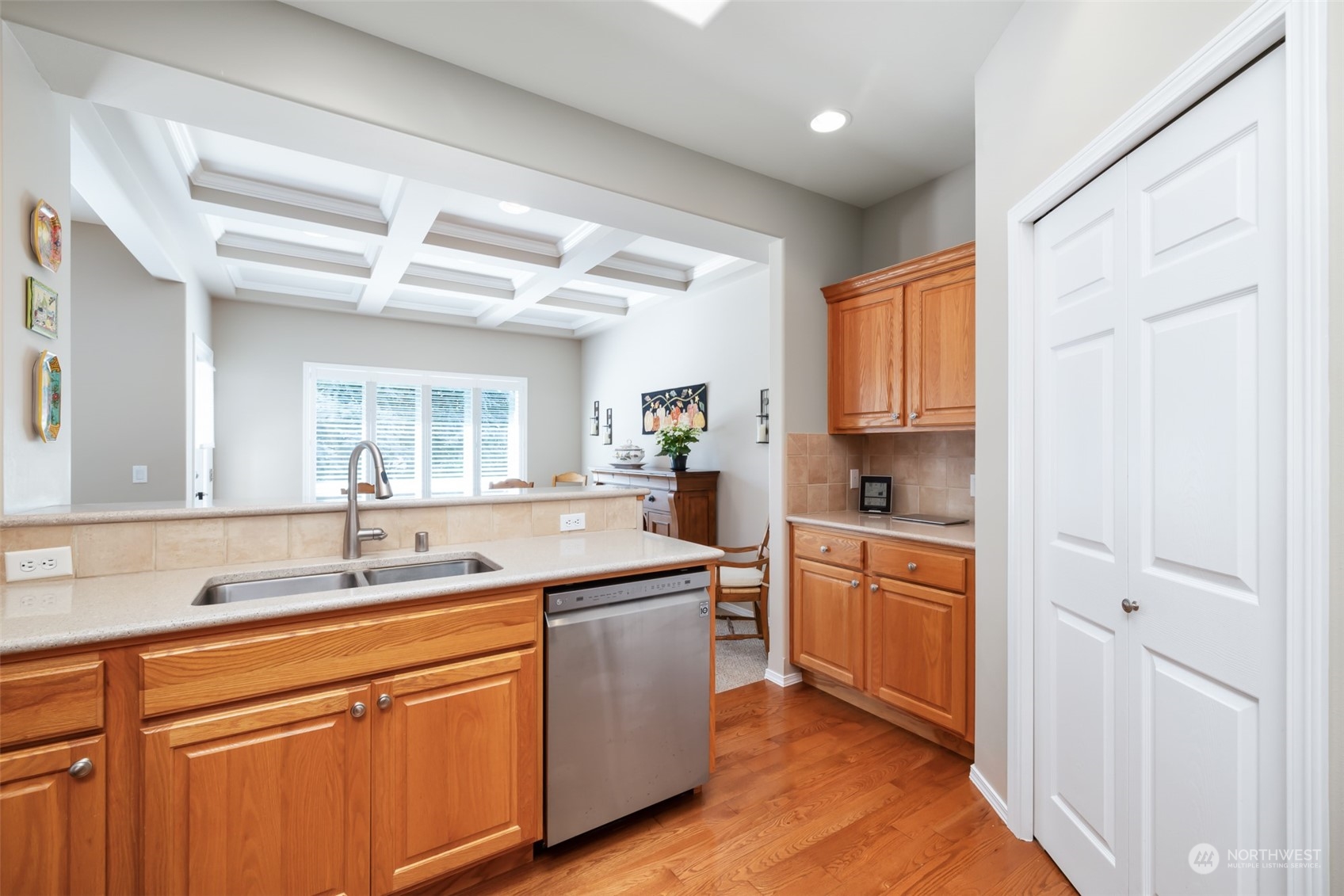 431 Blakely Boulevard Sequim, WA 98382 - Photo 13 of 34 a kitchen with stainless steel appliances granite countertop a sink and cabinets
