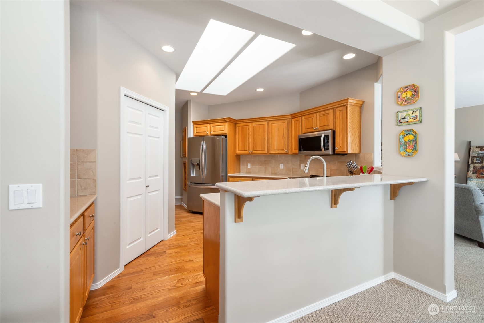 431 Blakely Boulevard Sequim, WA 98382 - Photo 14 of 34 a kitchen with stainless steel appliances a refrigerator and a sink