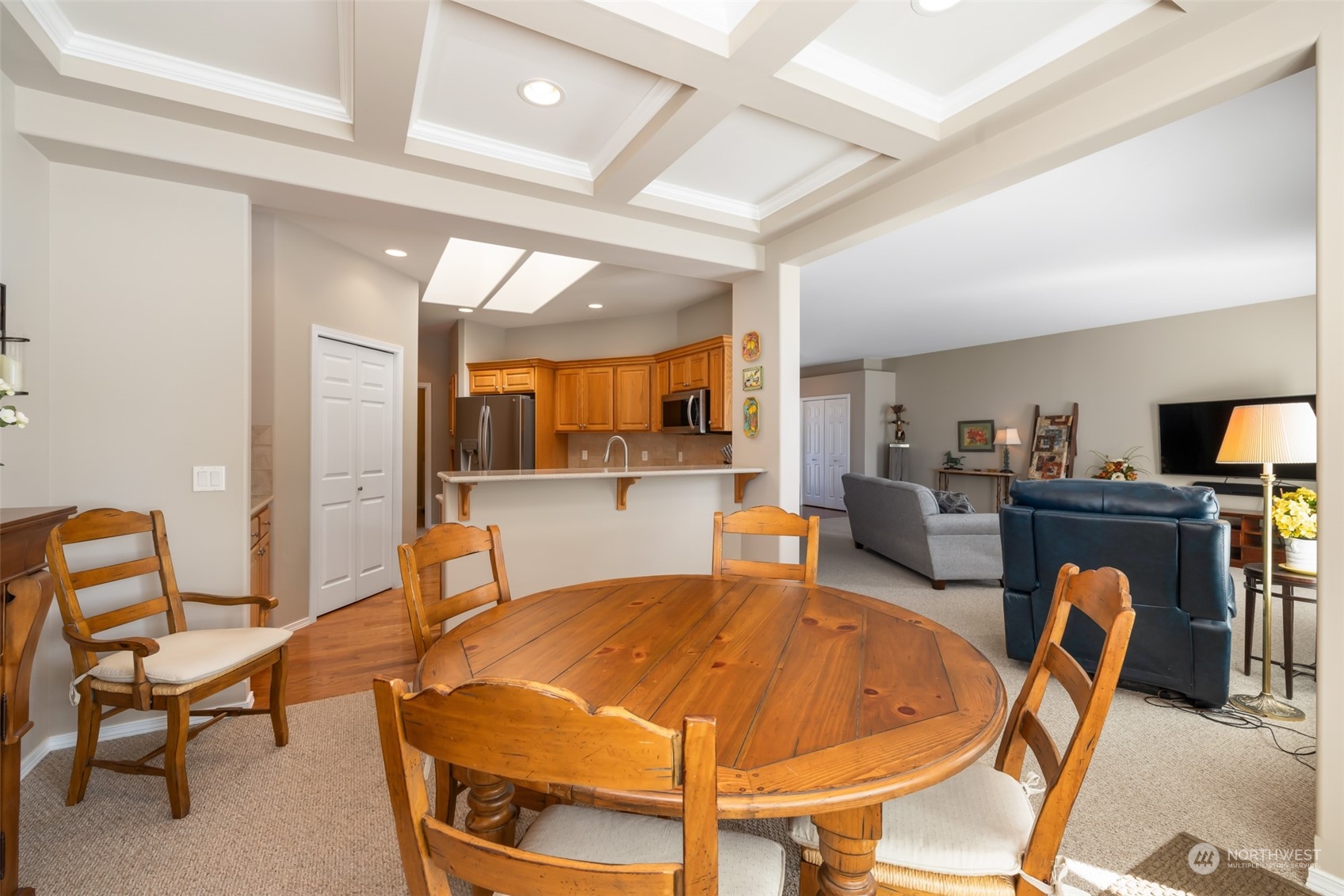 431 Blakely Boulevard Sequim, WA 98382 - Photo 16 of 34 a living room with furniture a flat screen tv and kitchen view