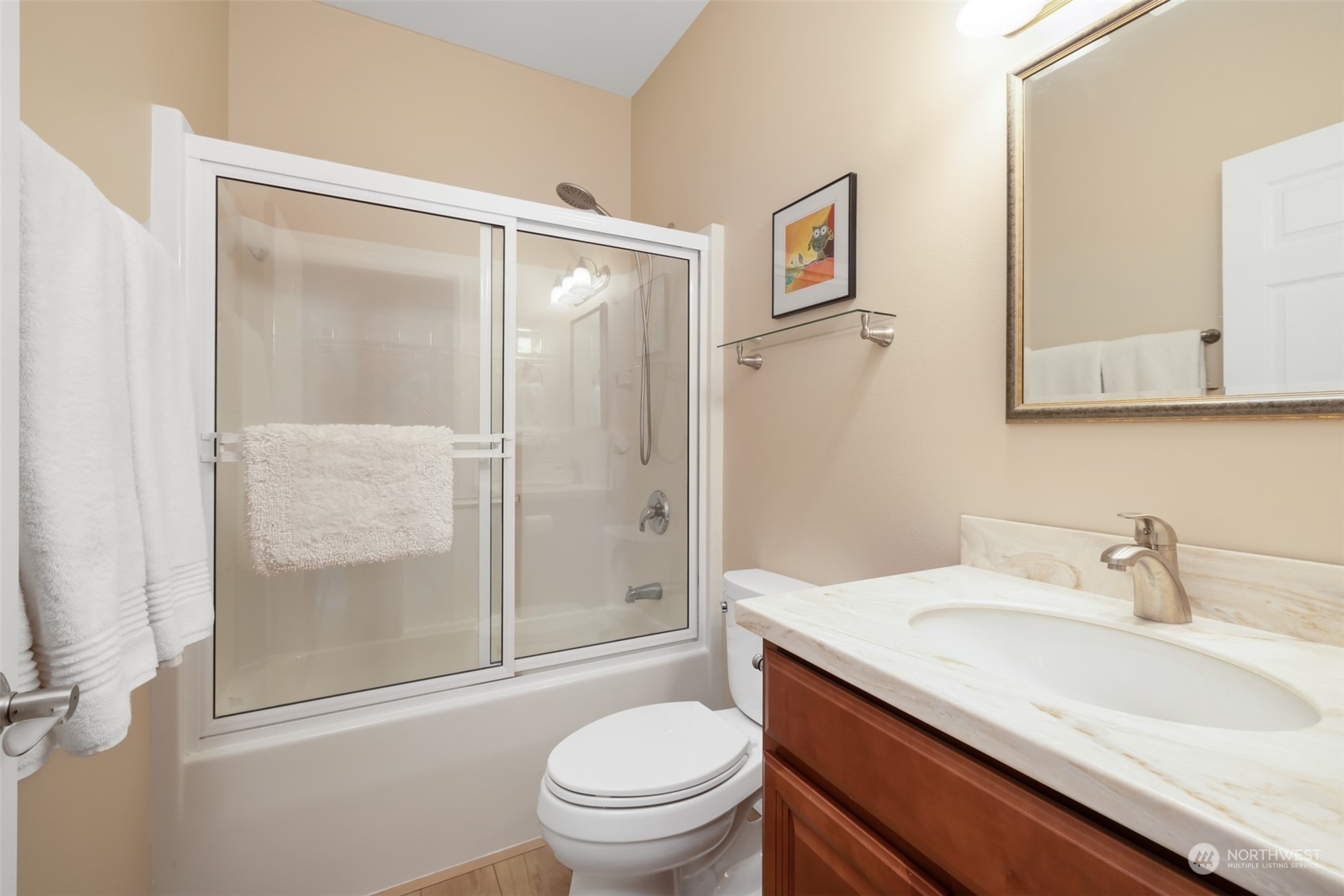 431 Blakely Boulevard Sequim, WA 98382 - Photo 21 of 34 a bathroom with a sink toilet and shower