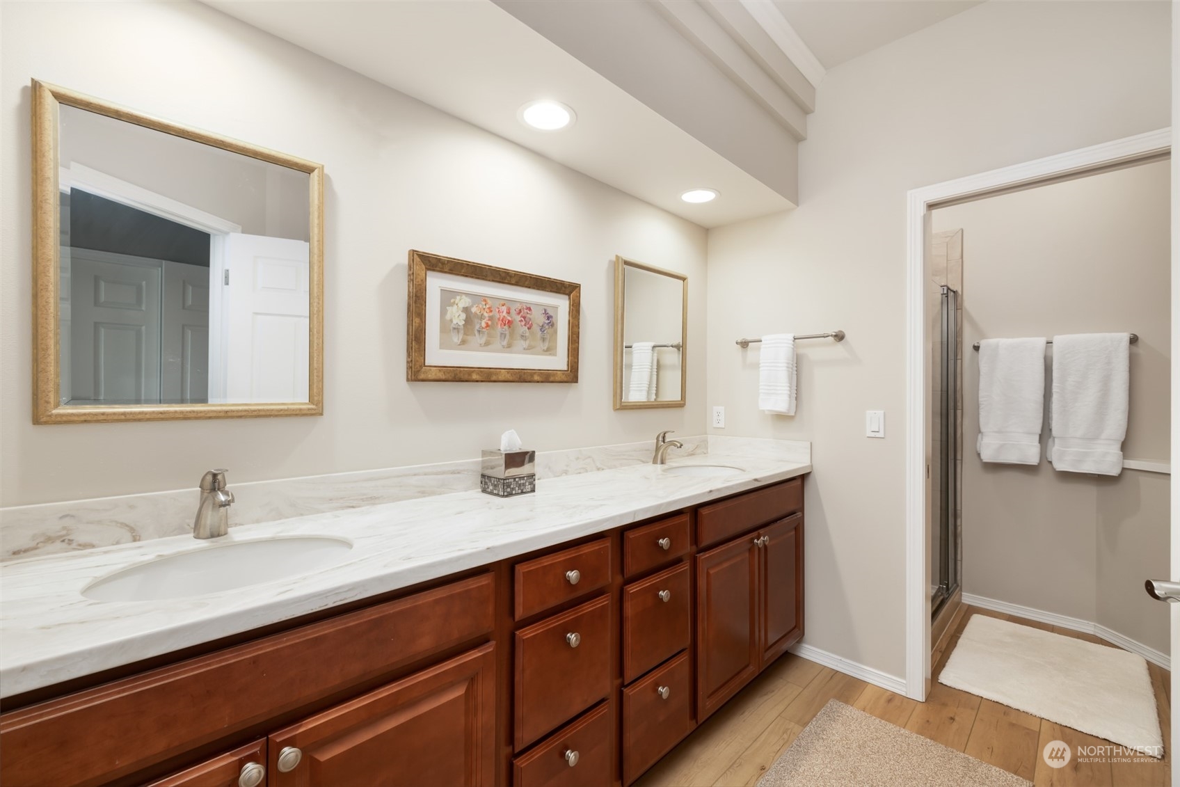 431 Blakely Boulevard Sequim, WA 98382 - Photo 25 of 34 a bathroom with a double vanity sink and mirror
