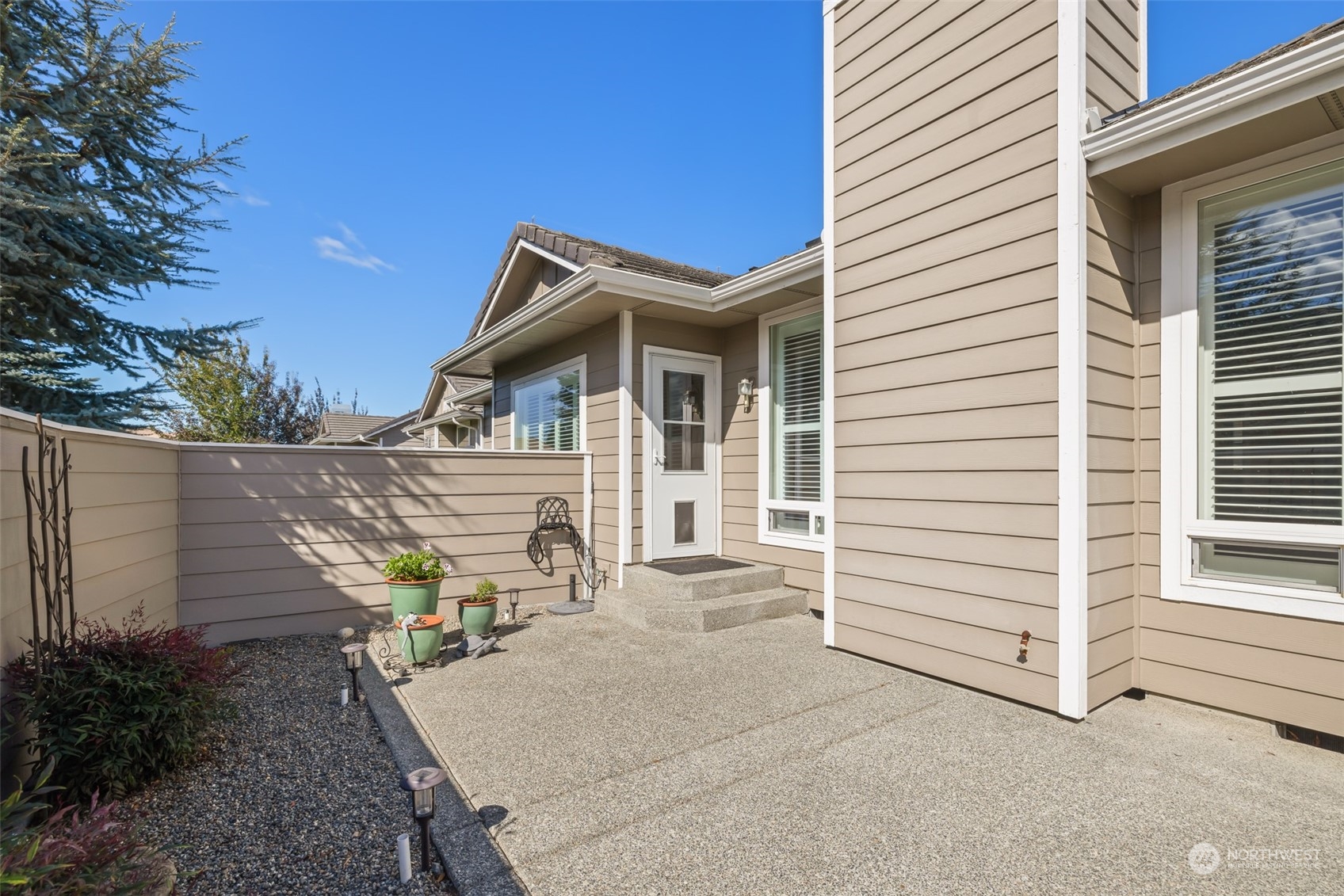 431 Blakely Boulevard Sequim, WA 98382 - Photo 28 of 34 a house view with a outdoor space