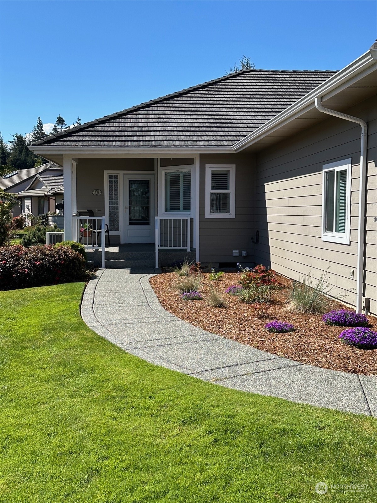 431 Blakely Boulevard Sequim, WA 98382 - Photo 4 of 34 a view of a house with a patio