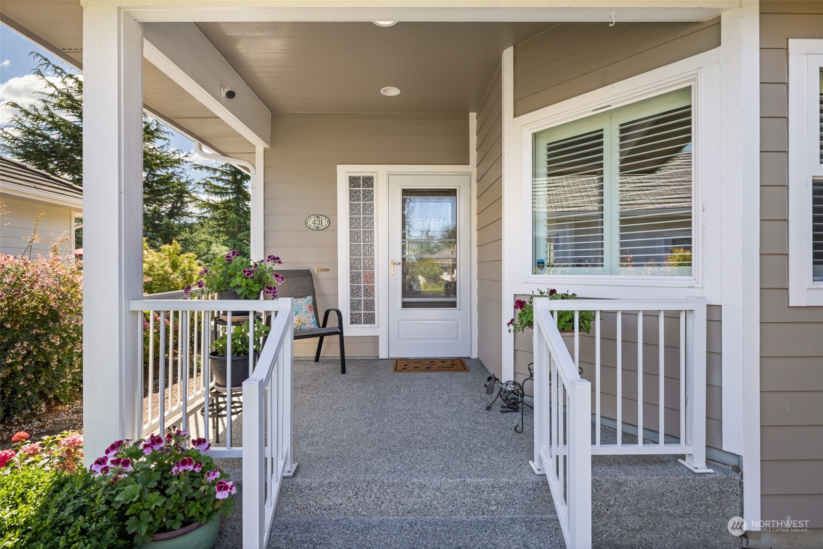 431 Blakely Boulevard Sequim, WA 98382 - Photo 5 of 34 a view of a balcony with flower plants