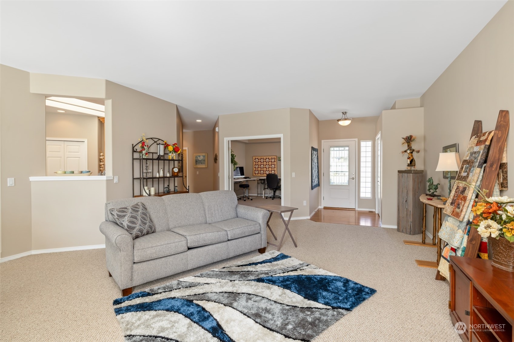 431 Blakely Boulevard Sequim, WA 98382 - Photo 10 of 34 a living room with furniture and a flat screen tv