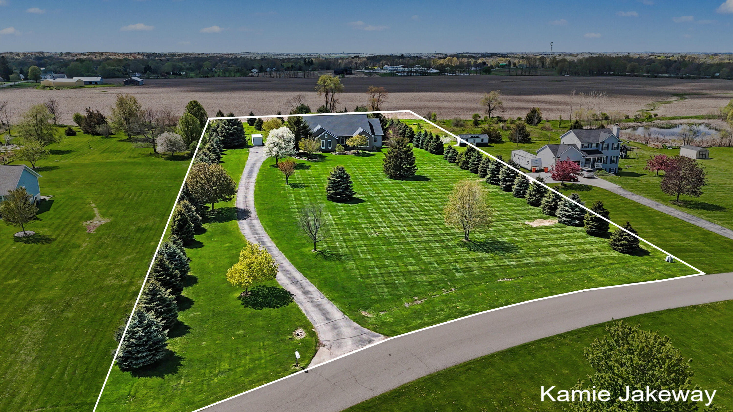 5093 Clear Ridge Drive Ada, MI 49301 - Photo 36 of 41 DJI_20260430151543_0170_D-lot line w Wat