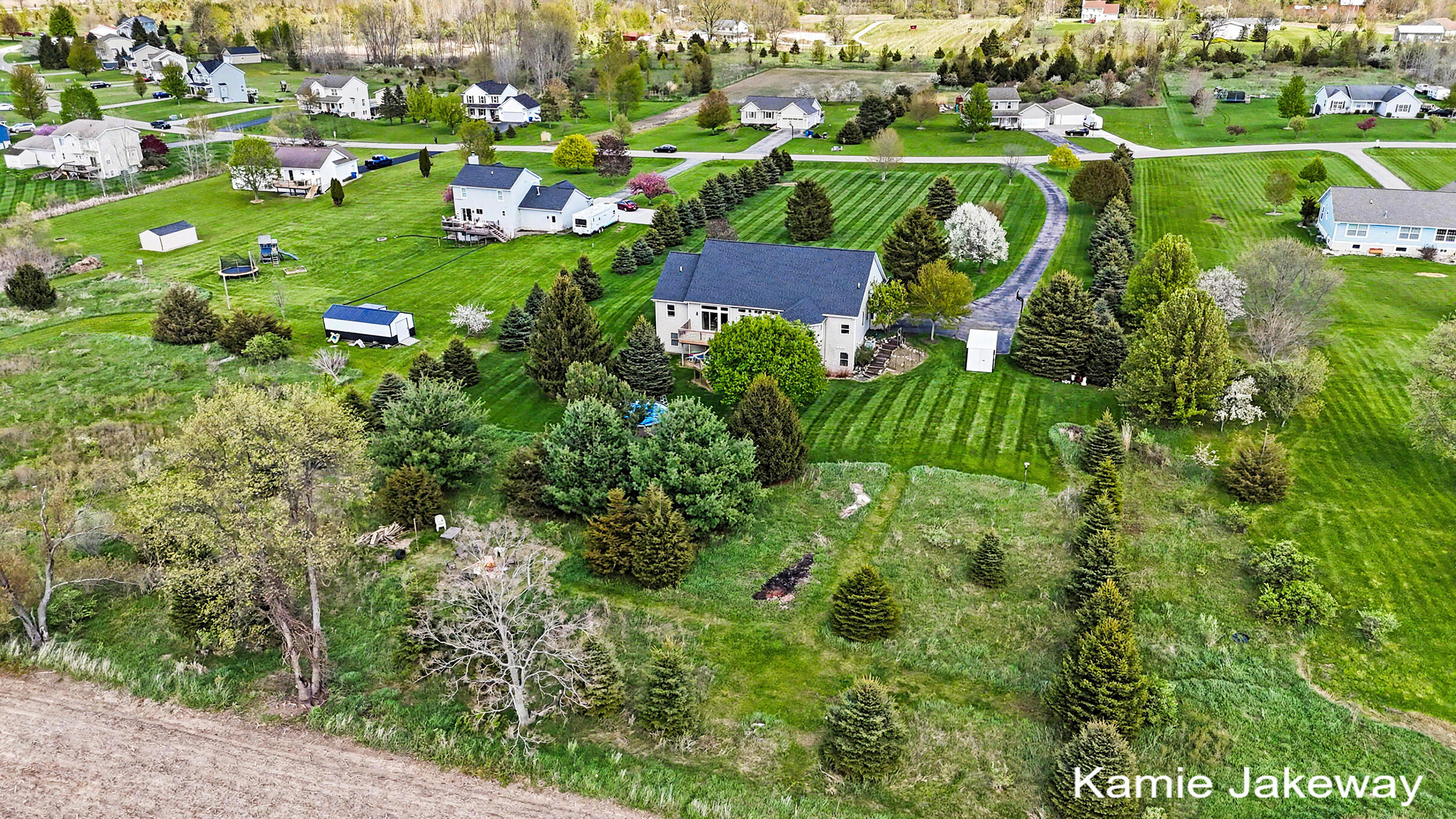 5093 Clear Ridge Drive Ada, MI 49301 - Photo 6 of 41 DJI_20260430151648_0172_D