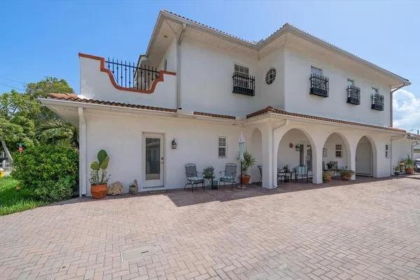 a backyard of a house and a beach