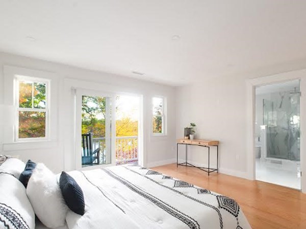 90 Evergreen Road Natick, MA 01760 - Photo 15 of 22 a bedroom with a bed and a large window