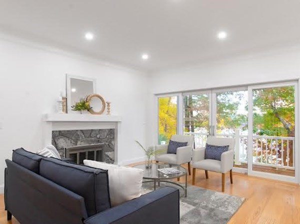 90 Evergreen Road Natick, MA 01760 - Photo 22 of 22 a living room with furniture and a fireplace