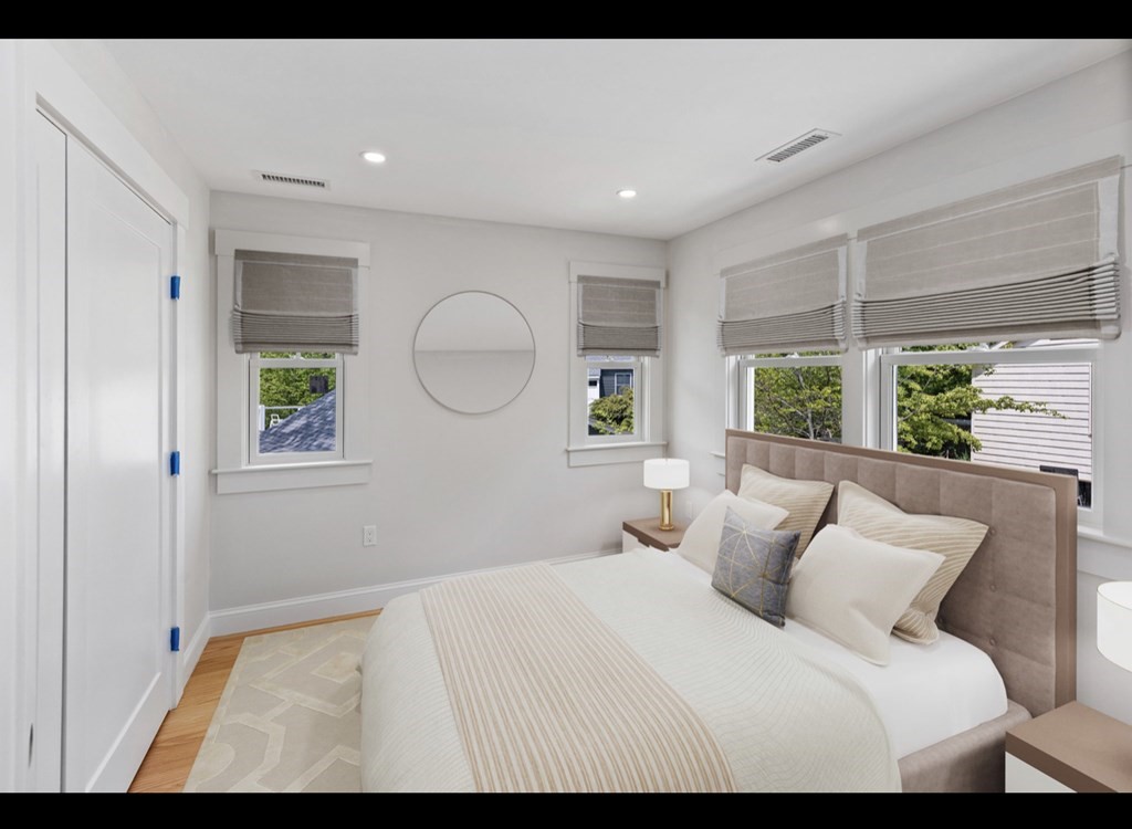 90 Evergreen Road Natick, MA 01760 - Photo 4 of 22 a bedroom with a large bed and a window