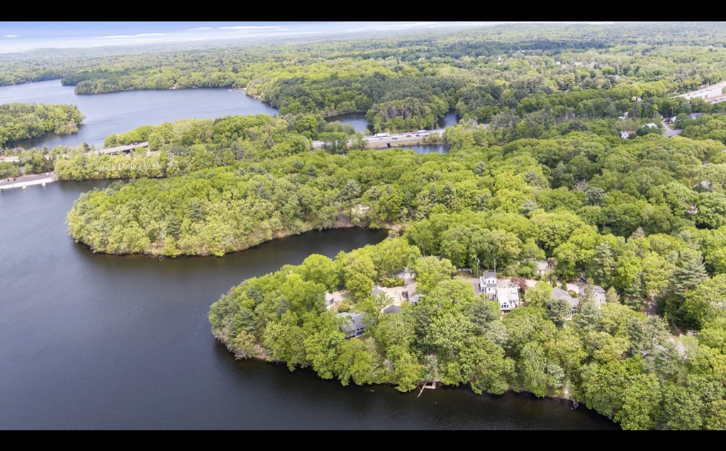 90 Evergreen Road Natick, MA 01760 - Photo 10 of 22 a view of a lake from a yard